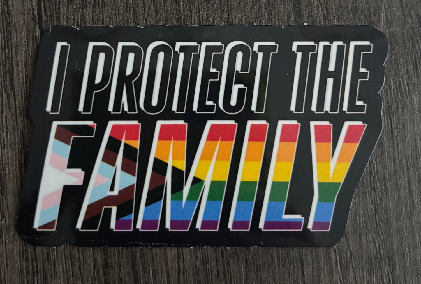 I PROTECT THE FAMILY (LGBTQIA+ VERSION) STICKER