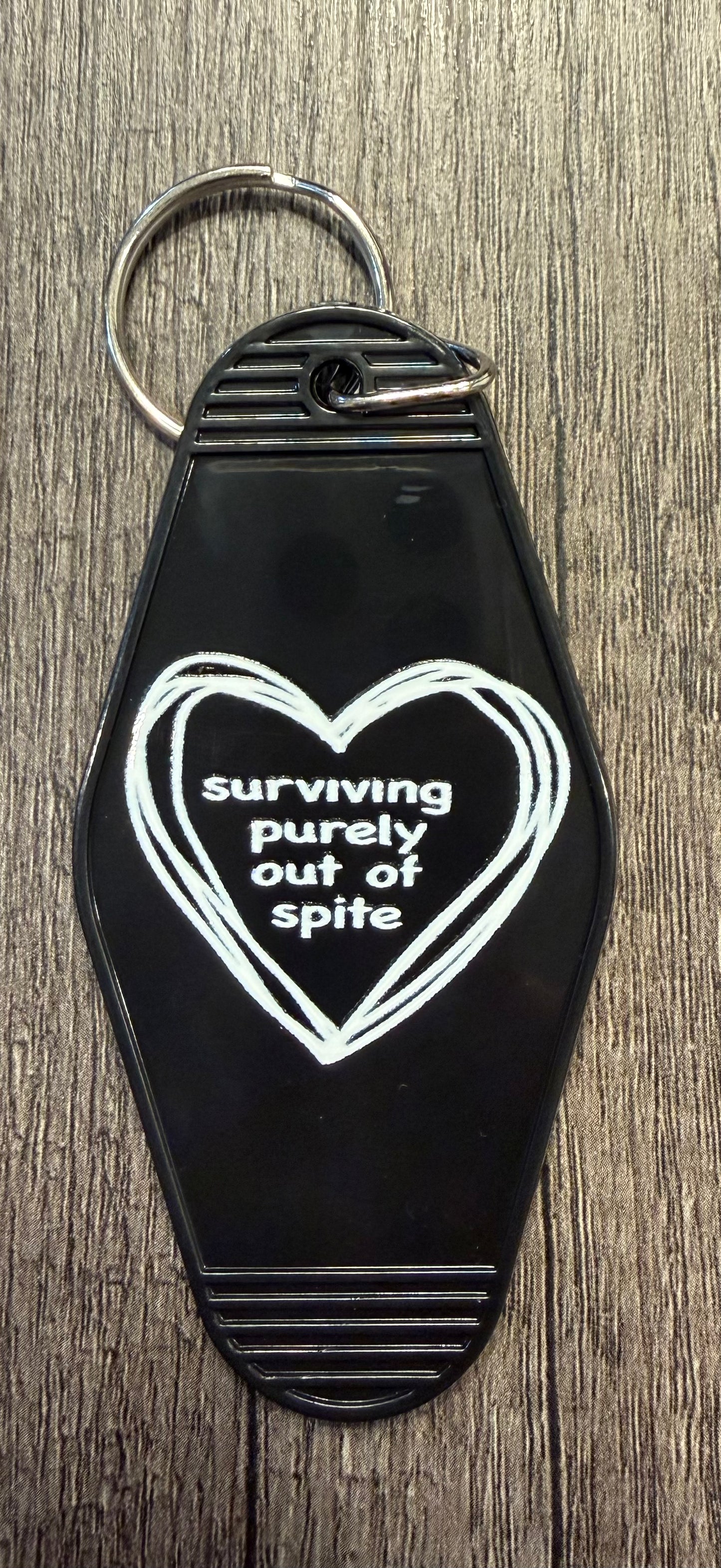 SURVIVING PURELY OUT OF SPITE KEYCHAIN