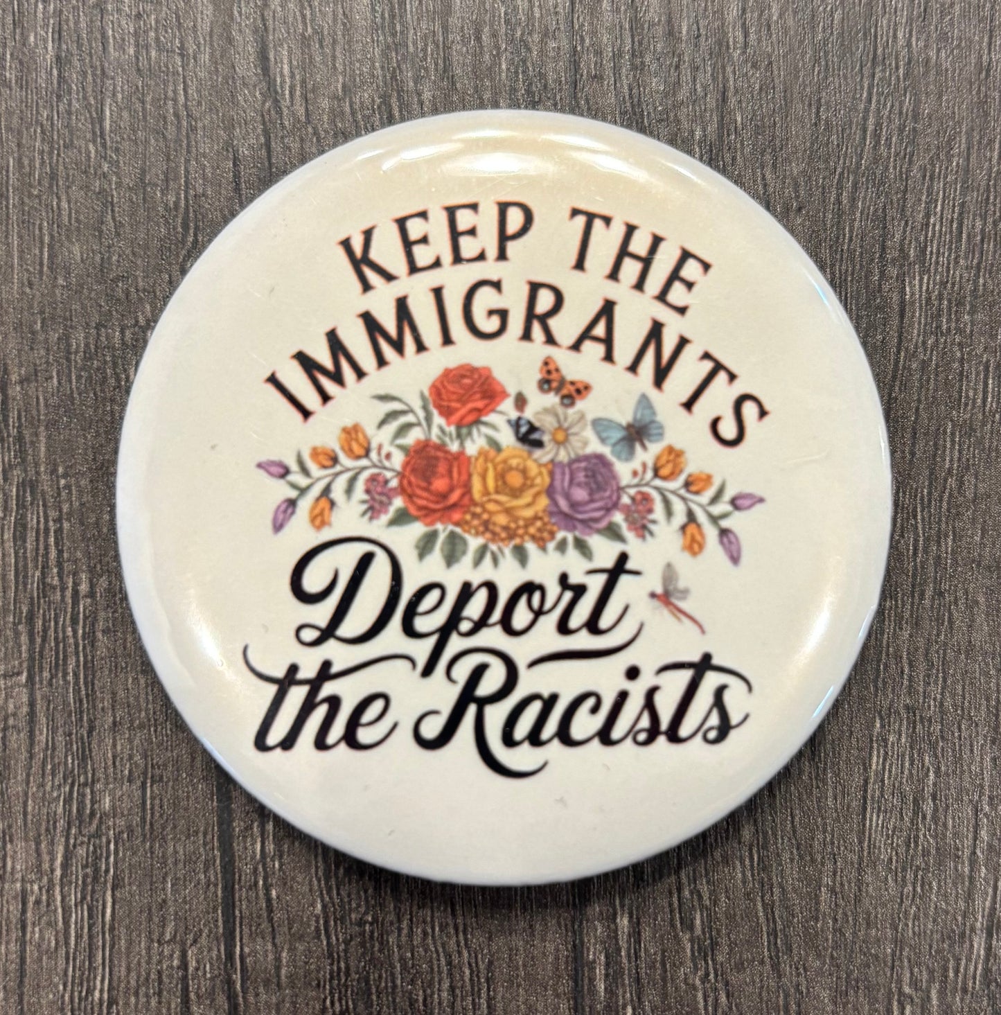 KEEP THE IMMIGRANTS DEPORT THE RACISTS BUTTON/MAGNET