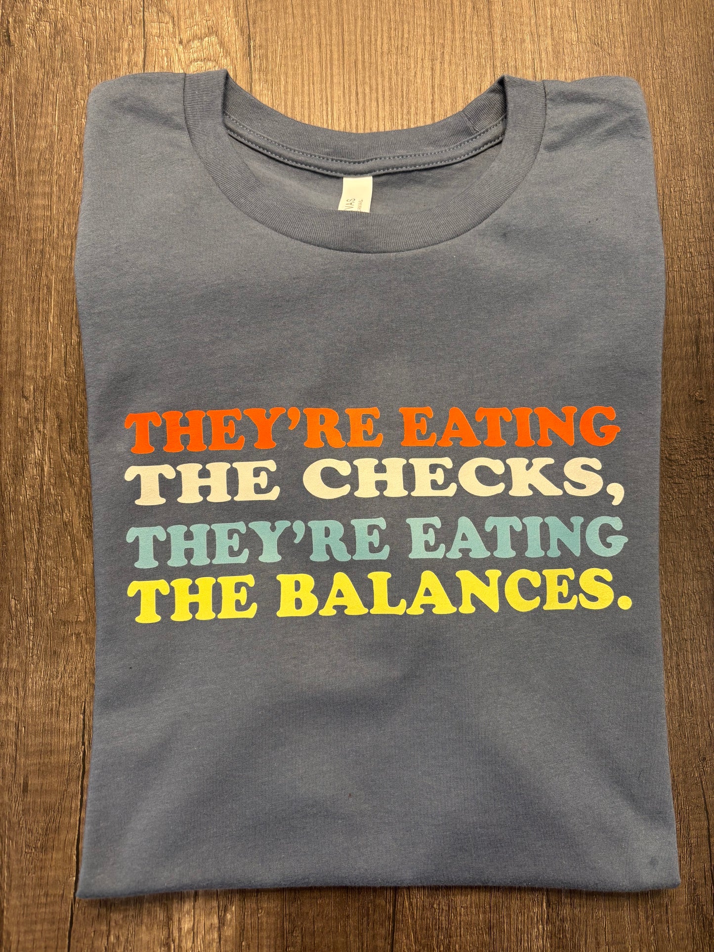 THEY’RE EATING THE CHECKS SHIRT