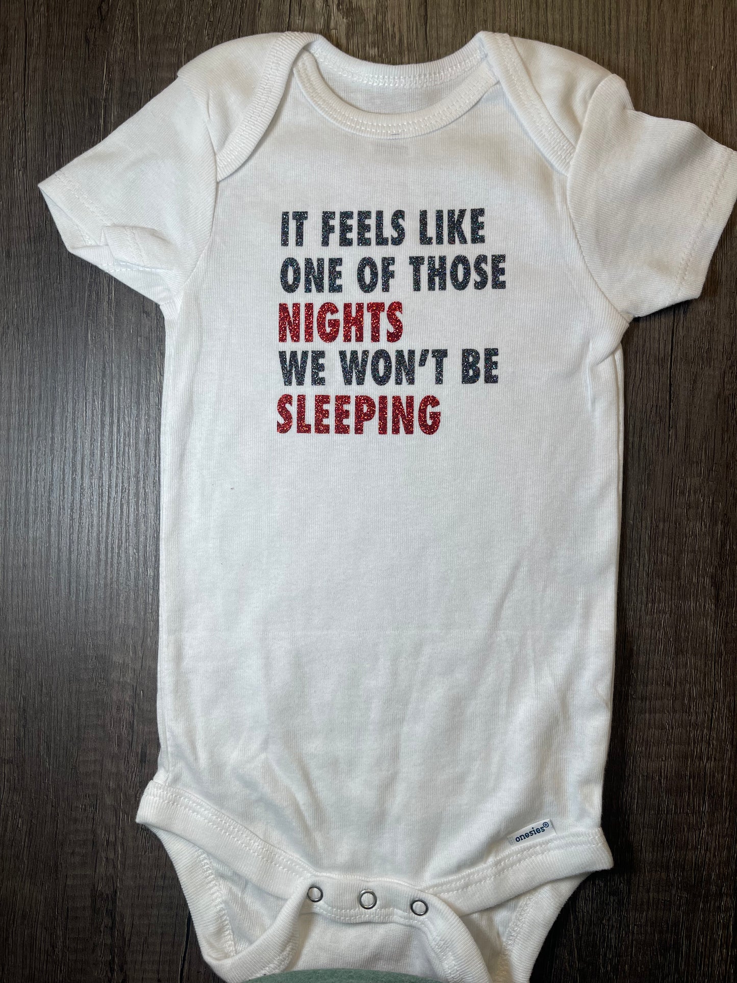 WE WON’T BE SLEEPING ONESIE