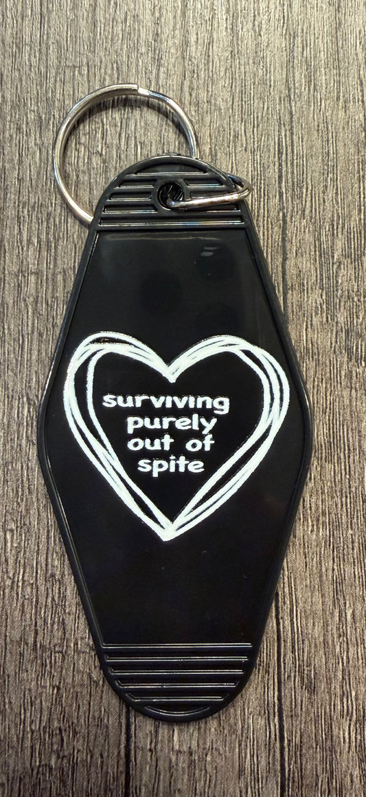 SURVIVING PURELY OUT OF SPITE KEYCHAIN