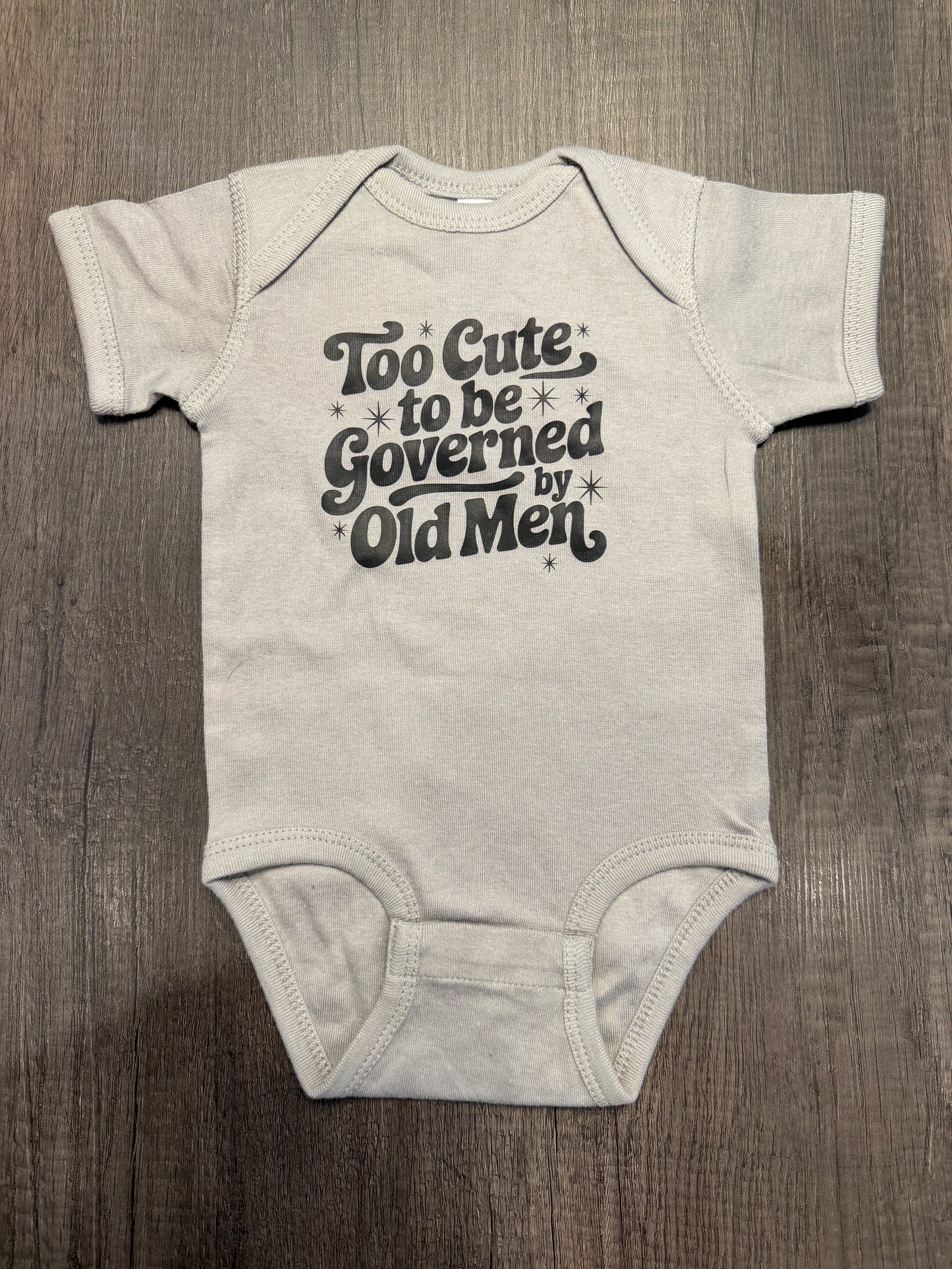 TOO CUTE TO BE GOVERNED BY OLD MEN ONESIE, 6M