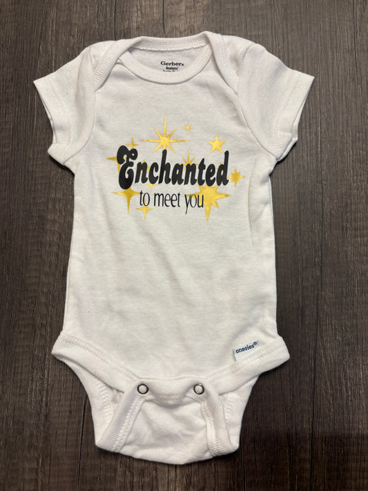 ENCHANTED TO MEET YOU ONESIE