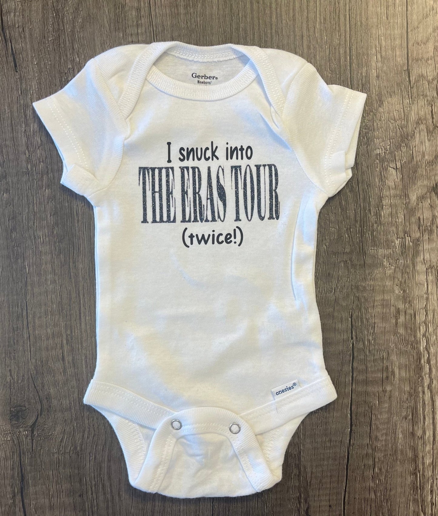 I SNUCK INTO THE ERAS TOUR ONESIE - FrankieDeLeonDesigns