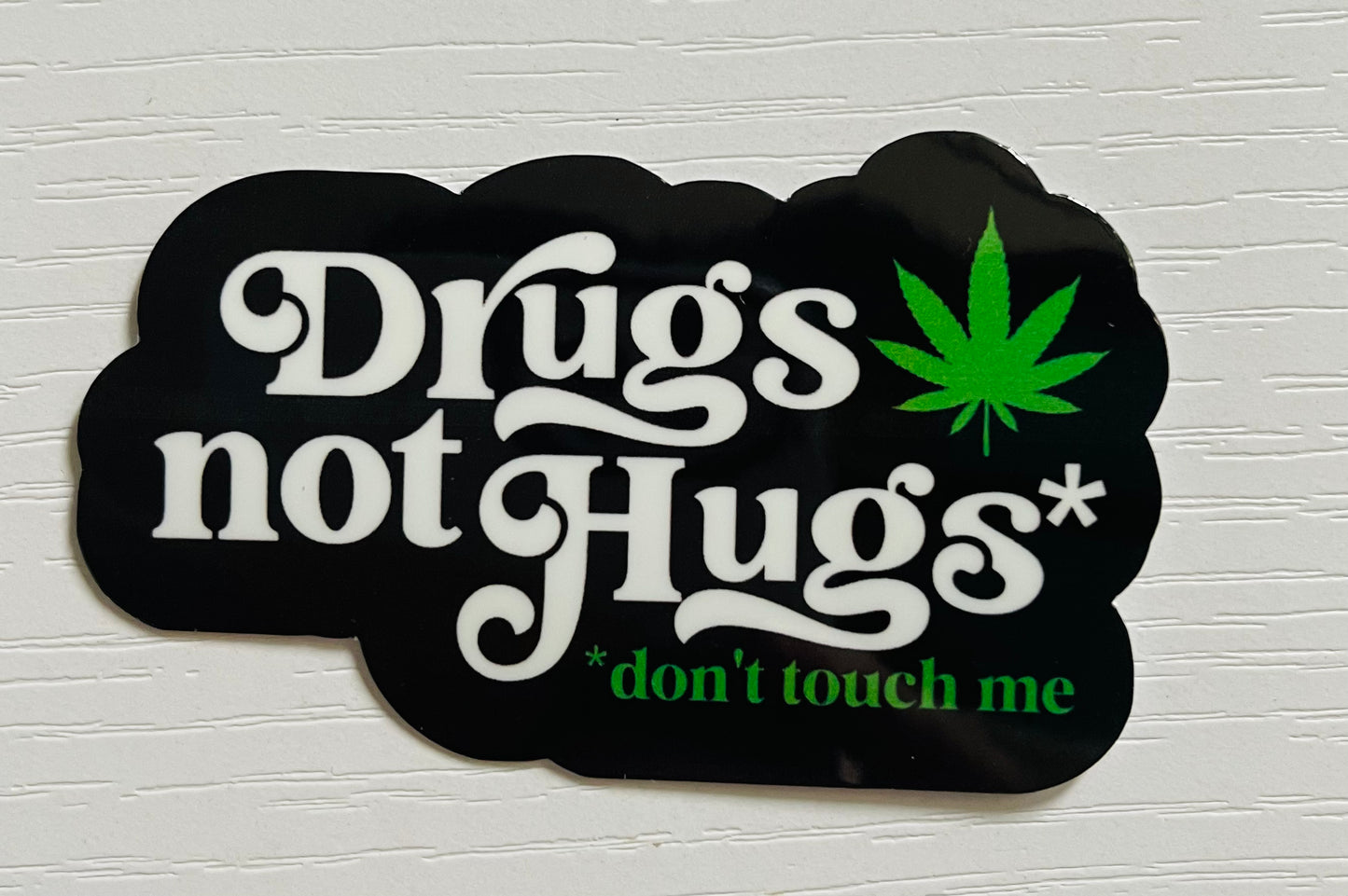 DRUGS NOT HUGS STICKER